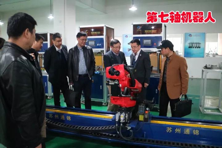 高新區(qū)機電商會考察蘇州通錦精密工業(yè)股份有限公司